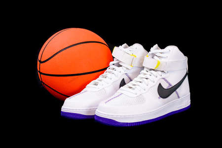NEW YORK - NOV. 8, 2019: A modern take on the classic Nike Air Force 1 High Top Basketball shoes sneakers with purple and yellow touches with leather and mesh combinationのeditorial素材
