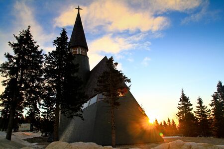 Modern church and sunriseの写真素材