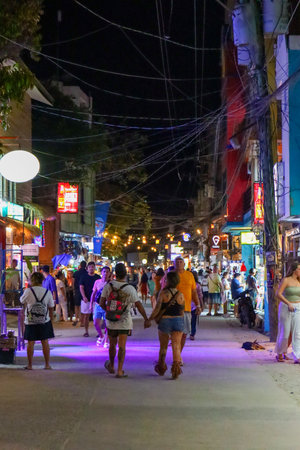Unidentified people walking in the night street in Pattaya, Thailand. Pattaya is the capital and largest city of Thailand.の写真素材