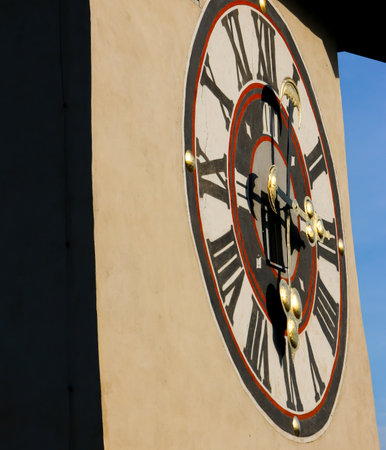 clock tower in italy europe milan    religion and sunlightの写真素材