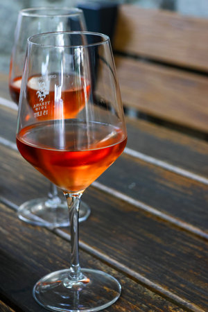 Wine tasting in Tomaj, Slovenia on a sunny dayの写真素材