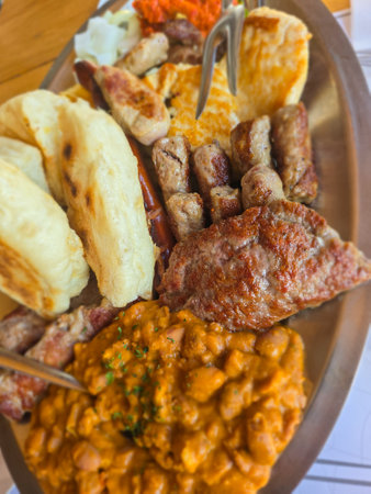 Traditional Turkish and Greek dinner appetizer platter with meat and vegetablesの写真素材
