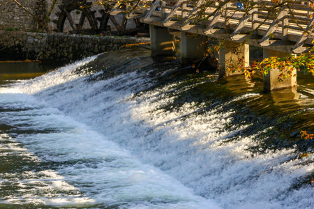Waterfall in the park in the evening, close-up.の写真素材