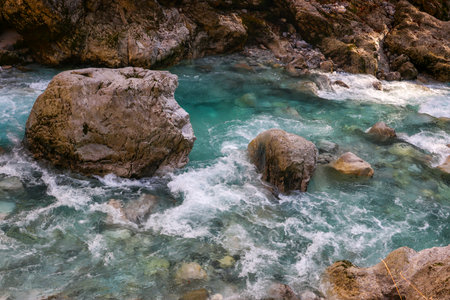 Beautiful turquoise water in a mountain river. Natural backgroundの写真素材