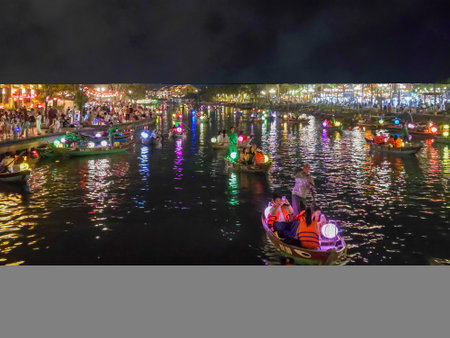 Unidentified people on the floating market at night.の写真素材