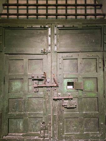 Old wooden door with iron lock in the castle.