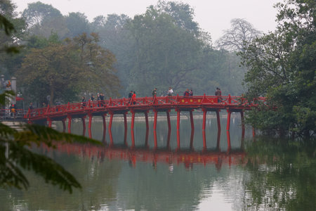 The red bridge in the park at Hanoi, Vietnam.の写真素材