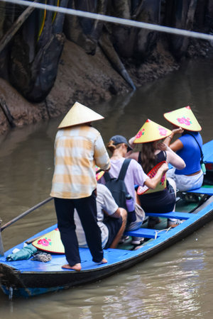 Unidentified Thai people travel by boat in Ratchaburi, Thailand.の写真素材