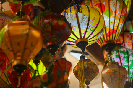 Colorful paper lanterns hanging on the ceiling in the market.