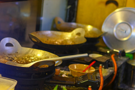 pot and pans in a restaurant, closeup photo with selective focusの写真素材