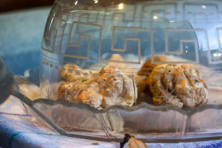 Bread in a glass jar on the table in the kitchen.の写真素材
