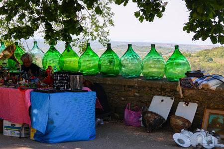 Vintage green bottles for sale at a flea market in Franceの写真素材