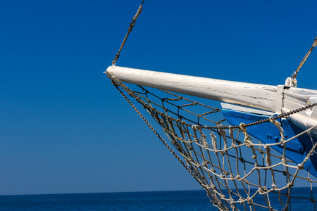 fishing net on a boat against the blue sea and blue sky