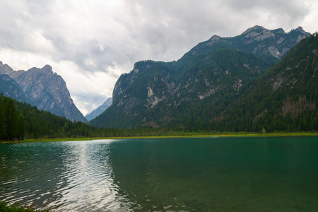 Landscape view of Dolomites mountains and lake, Italy.