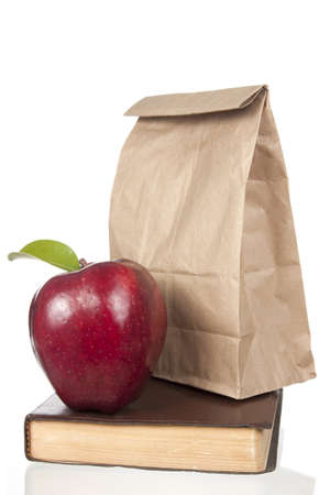 Back to School Apple, Lunch and Book on white backgroundの写真素材