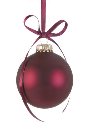 Hanging Red Christmas Bauble with a bowの写真素材