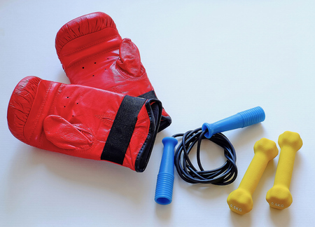 Gloves jump rope and dumbbells for boxer athleteの写真素材