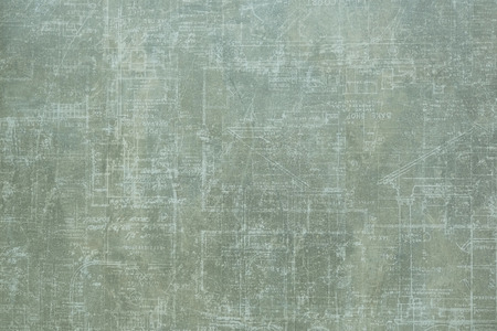 The texture of the paper. A sheet of dark gray paper.