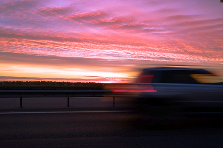 Interchange of the highway. Dramatic sky, fiery sunset.の写真素材