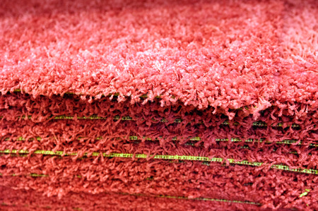 Stack gray bath mats bath mats Stack, stacked on top of each other. Terry mats.