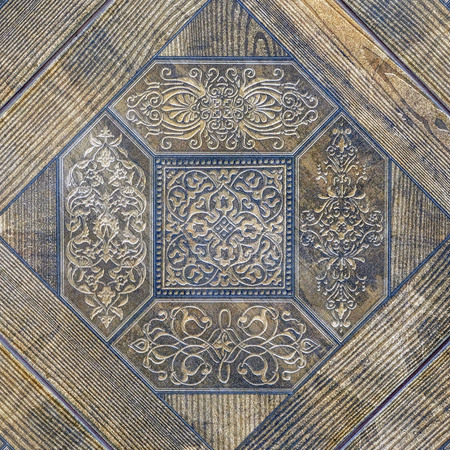 Decorative brown sand stone tile background. eramic tile with pattern