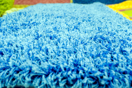 A quality carpet in macro photography top view with one fiber is distinguishable. Different color.