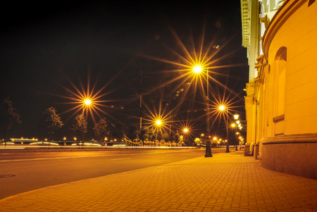 Night city street lights, bokeh, background, darkness. Night lights of the city Rays from the lightsの写真素材