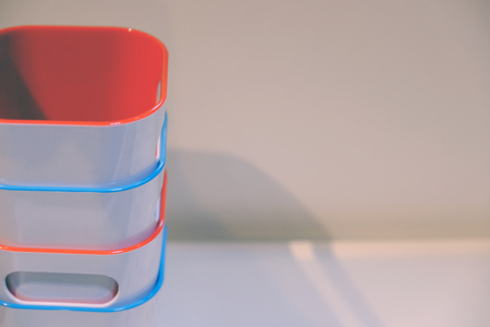 Plastic colored boxes for the garden. Box for growing flowers. On white backgroundの写真素材