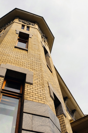 Cottage with panoramic large Windows. Glazing of the facade of the house. Tinted glass.の写真素材