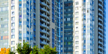 Modern residential building. Modern multi-storey building with glass facade