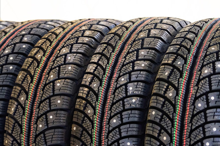 Winter car studded tires. Set of four pieces.