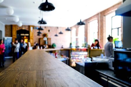 Artistic blurred background. Training course. Soft focus. People in the cafe drinking coffee, relax after the master classの写真素材