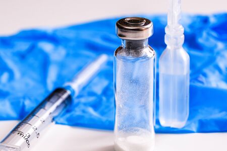 Vaccination is a method of creating immunity. Syringes, water for injections, ampoules medical...