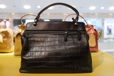 Women's shoulder bag made of crocodile skinの写真素材