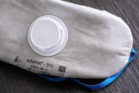 Respirator with exhalation valve, Alina 211. Protection class: FFP2 NR D. designed to protect the public from infections micro-organisms, bacteria and viruses transmitted by airborne droplets. Saint-Petersburg. RUSSIA. April 17 2020のeditorial素材