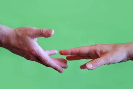 Two hands helping hand to a friendの写真素材