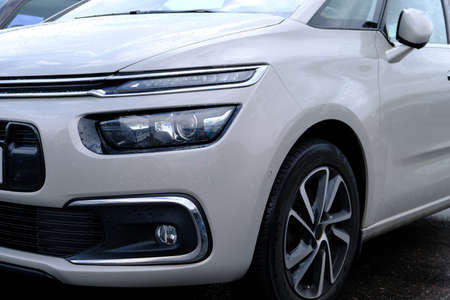 Modern headlights with a complex design and construction. Close-up of the front of the car.