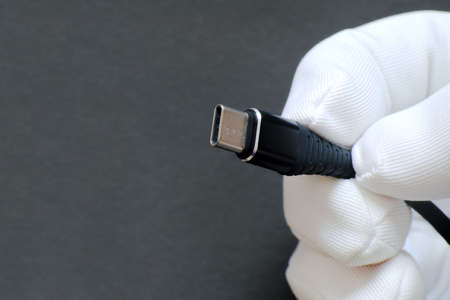 USB cable from USB to USB 3.1 type C. abstract gray background for ad design