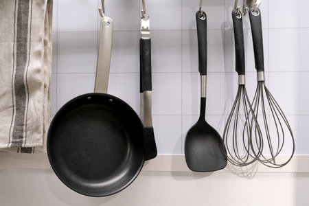 Kitchen utensils for cooking in a modern style on a white background. Home decor design. Modern home...