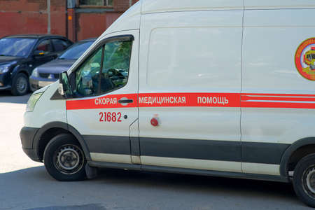 Emergency hospitalization with coronavirus. Car, ambulance. Transcription of the text of the...