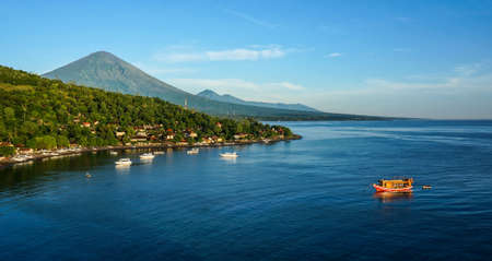 Scenic lagoon with boats in small village Amed on the East of Bali