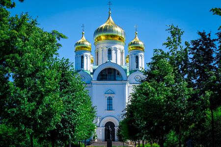 The architecture of the building is a church with golden baths