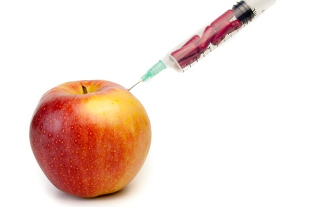 detail of a injection and a appleの写真素材