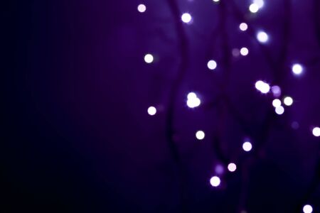 white defocused lights on abstract  violet backgroundの写真素材