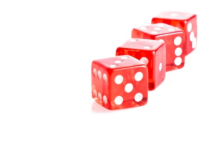 four red dice in a row on white background