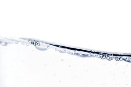 water splash with bubbles of air on the white backgroundの写真素材