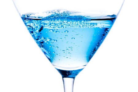 detail of blue cocktail with bubbles on a white backgroundの写真素材