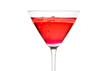 red cocktail with bubbles on white backgroundの写真素材