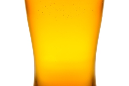 glass of beer on a white backgroundの写真素材