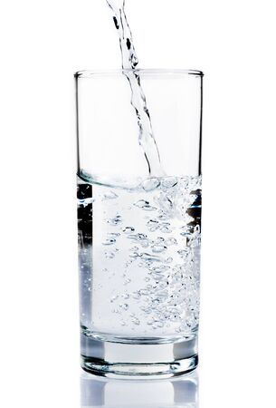 water splashing from glass isolated on white background